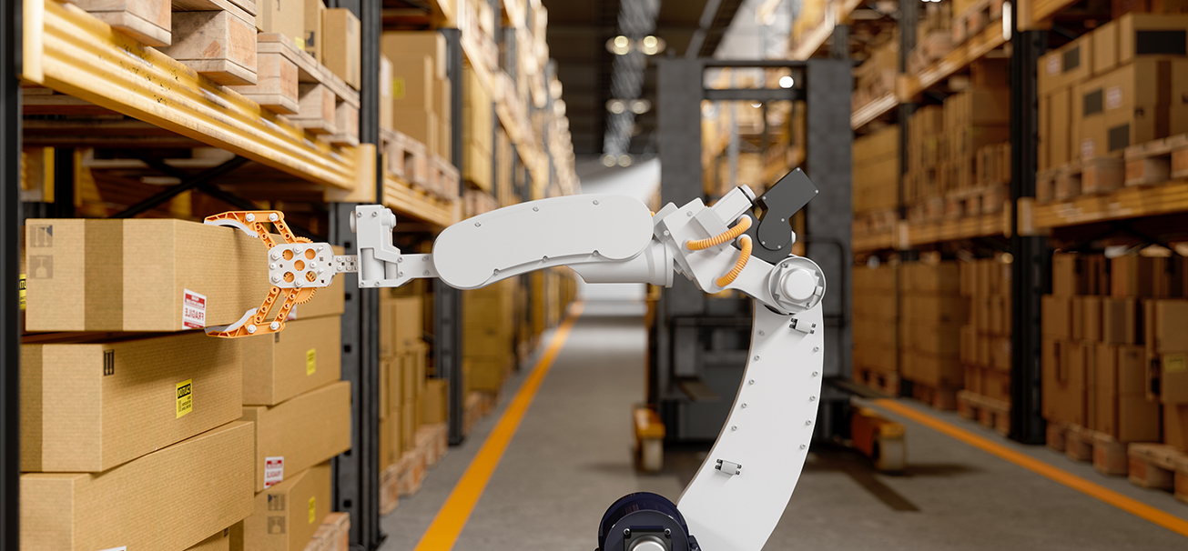 Robotic Arm Taking A Cardboard Box In The Warehouse